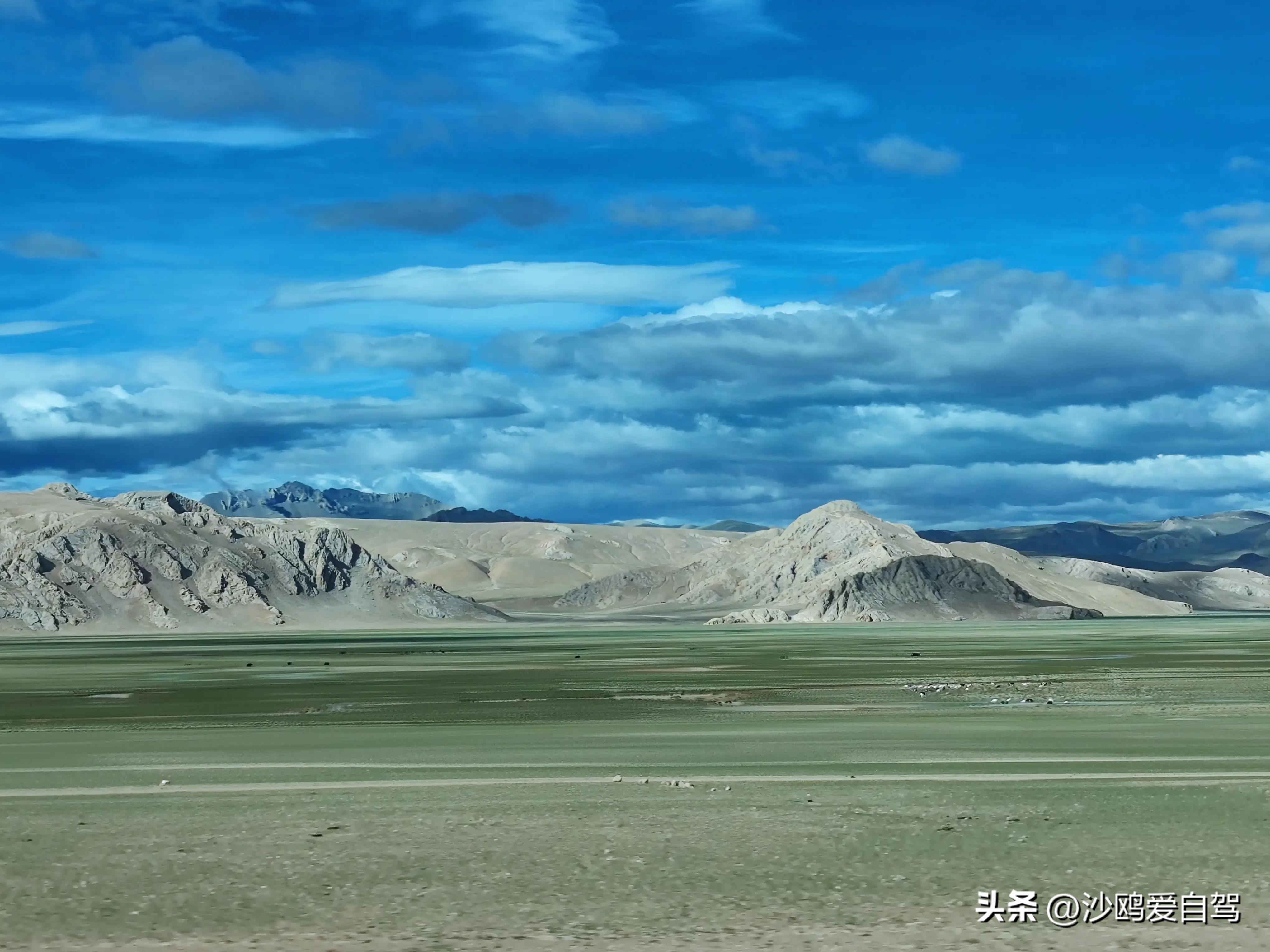 自驾四进*藏西***疆新**第12天:人在囧途:当惹雍措圣湖边陷车,轮胎鼓包