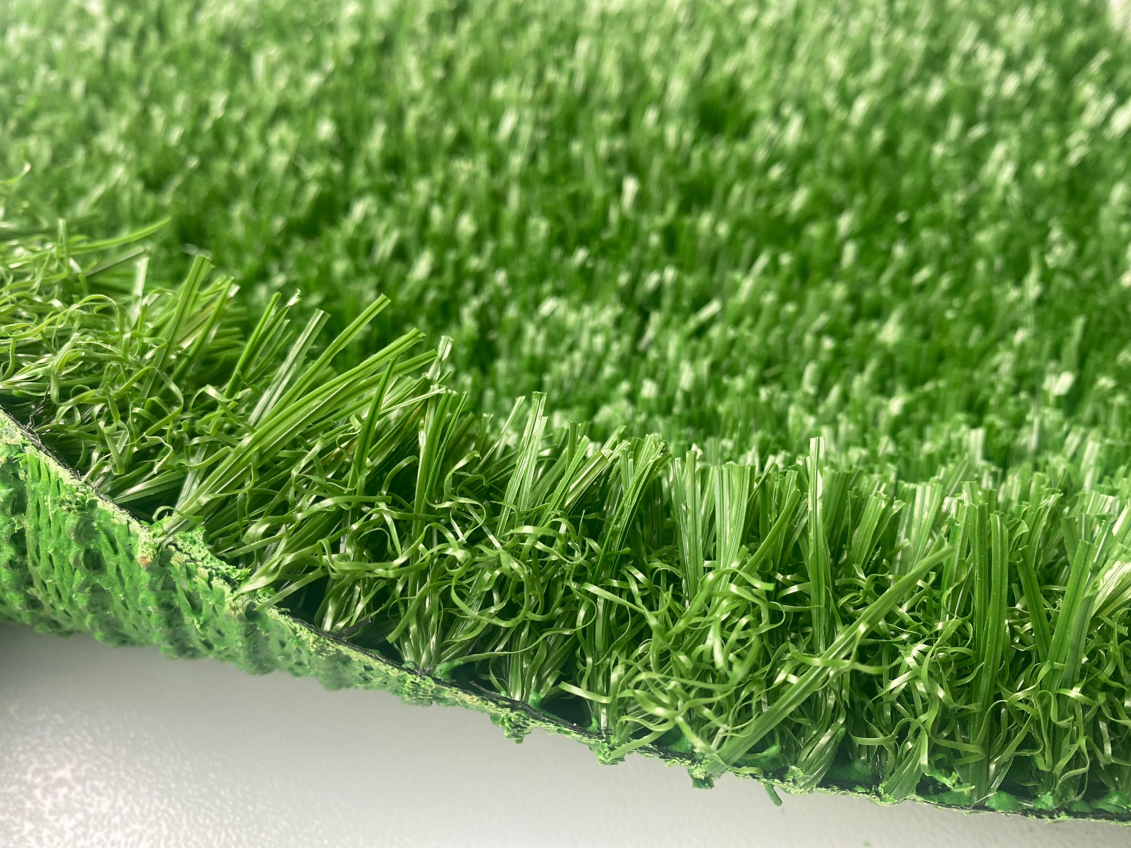 十堰人造草皮足球场多少钱,8人制人造草皮足球场造价