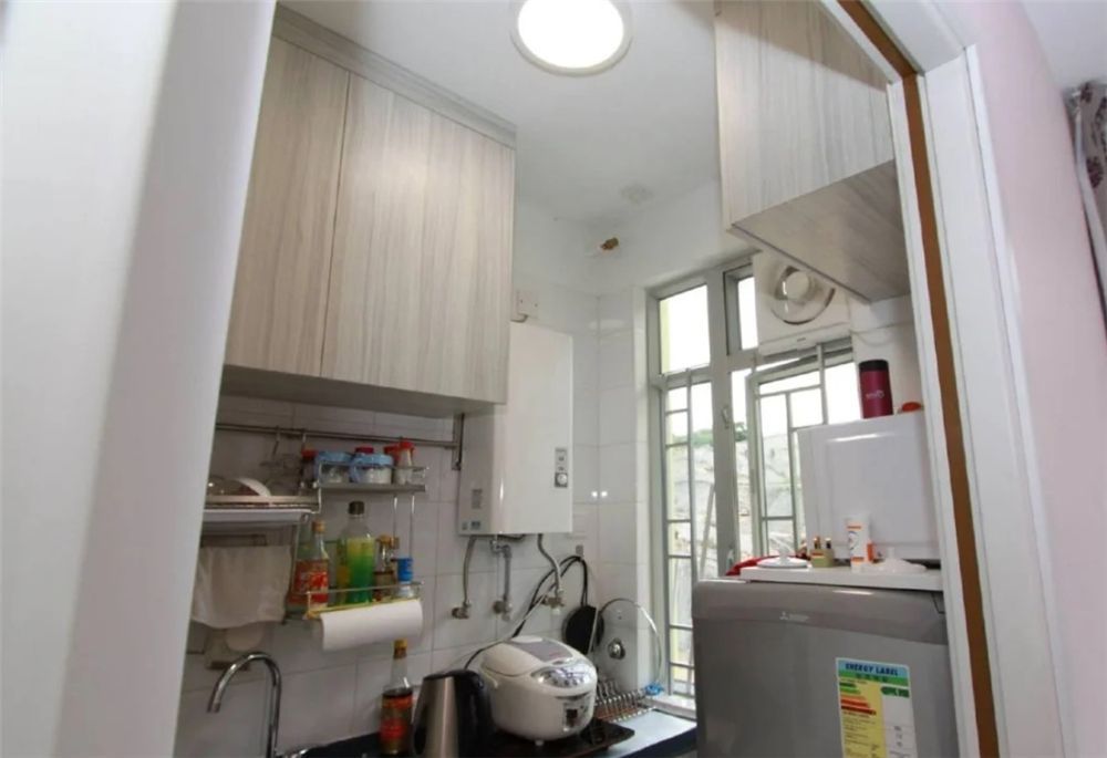 香港十几平蜗居夫妻,香港夫妻买下20平方蜗居