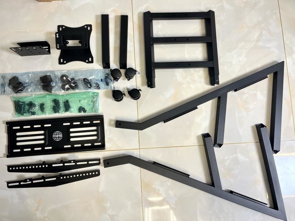 买个伸缩电视支架就搞定了,买移动电视支架