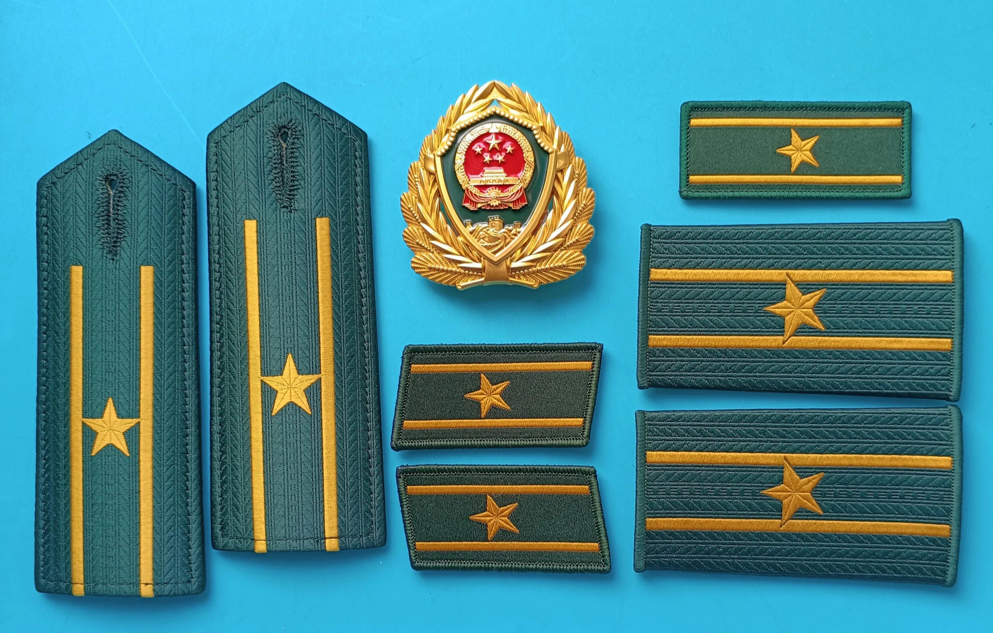 毛启国军装,毛启国警用帽徽