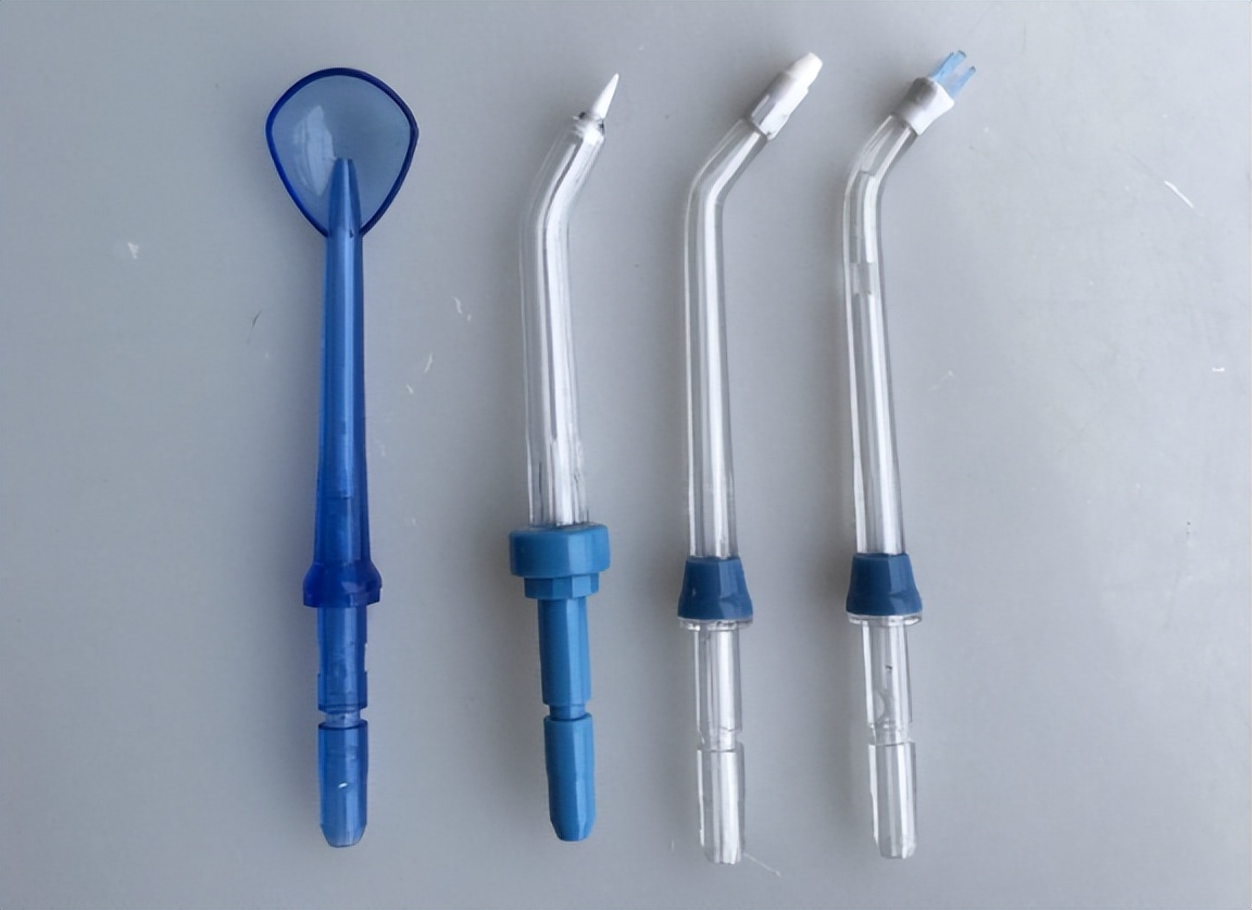 用冲牙器冲牙导致牙龈出血怎么办,使用冲牙器后牙龈红肿和牙齿分开