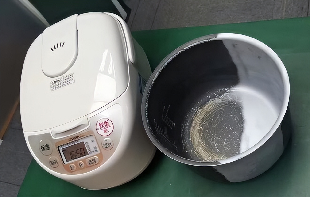 电饭锅内胆涂层脱落了还能使用吗,电饭锅内胆涂层脱落对人有害吗