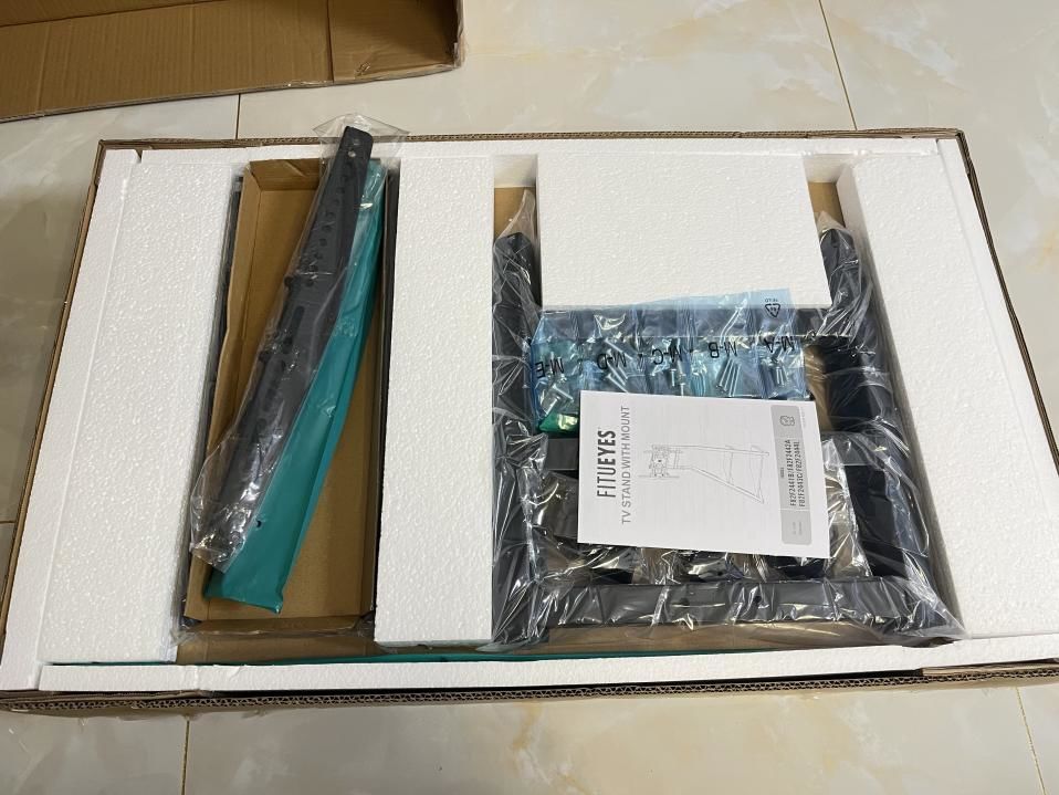 买个伸缩电视支架就搞定了,买移动电视支架