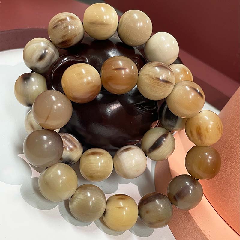 怎么辨别牦牛角的真假,怎样鉴别牦牛角手串真假