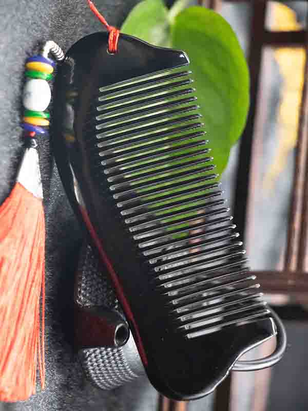 黑色牛角梳辨别真假,牛角梳用几度水试真假